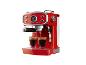 Machine à expresso rouge versant de l'espresso dans deux verres.