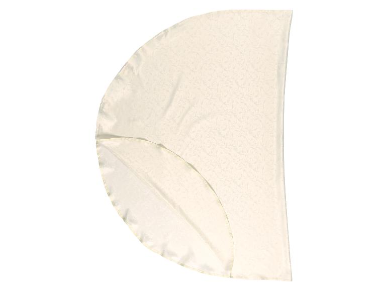 Nappe crème à motif floral, pliée en quatre