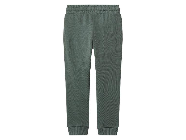 Pantalon de survêtement vert uni avec taille élastique et poignets.