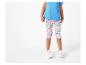Léggins enfant à motifs coquillages et t-shirt bleu.