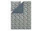 Parure de lit florale avec des fleurs roses et blanches sur fond sarcelle