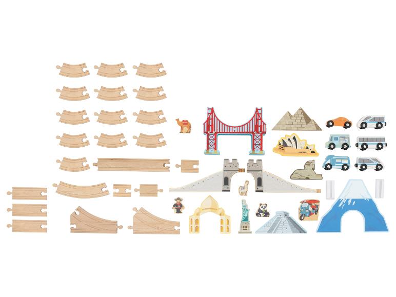 Ensemble de jouets en bois avec rails de train, véhicules et monuments célèbres du monde.