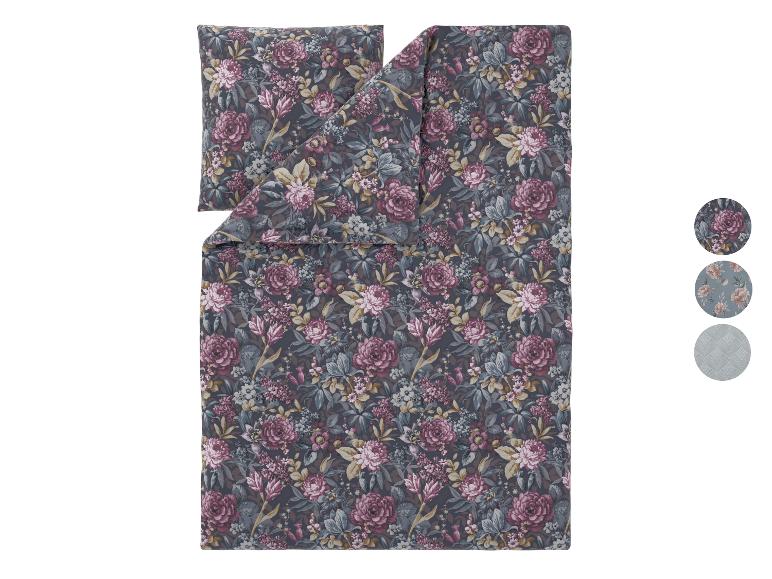 Parure de lit avec taie d'oreiller assortie, motif floral de roses mauves et grises.
