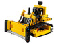 Un bulldozer LEGO jaune avec des chenilles noires.