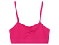 Un soutien-gorge de sport rose avec des bretelles fines.