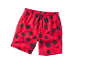 Short de bain rouge à imprimé palmier.