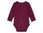 Un body bébé couleur bordeaux à manches longues.