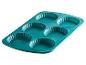 Un moule en silicone bleu pour tartes ou gâteaux, de la marque Coox.