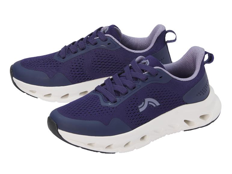 Chaussures de sport CRIVIT pour femme en violet avec semelle blanche.