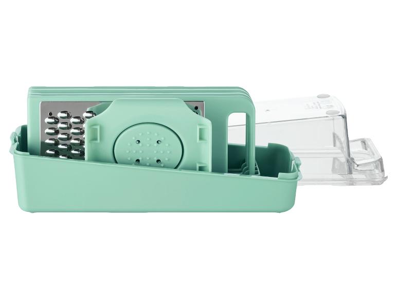 Une râpe multifonction verte dans un conteneur transparent