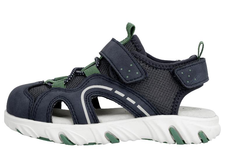 Sandales enfant bleu marine avec accents verts et semelle blanche.
