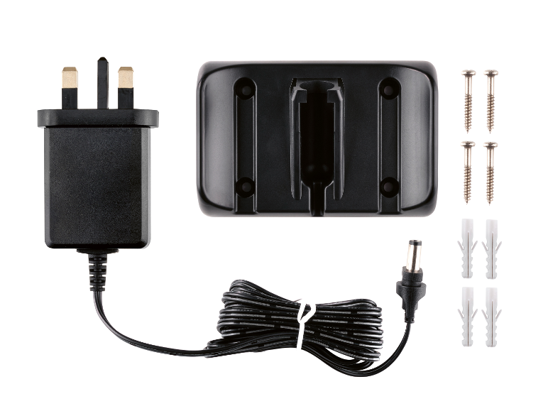 Un chargeur avec alimentation, prise et accessoires de montage.