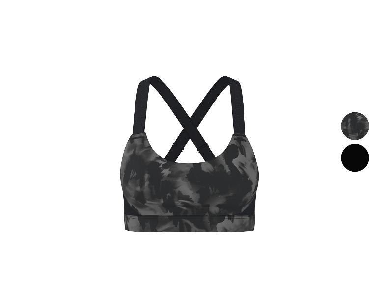 Soutien-gorge de sport à motif camouflage gris et noir avec bretelles croisées.