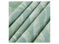 Tissu plié de couleur vert clair avec un imprimé blanc et vert de feuilles.