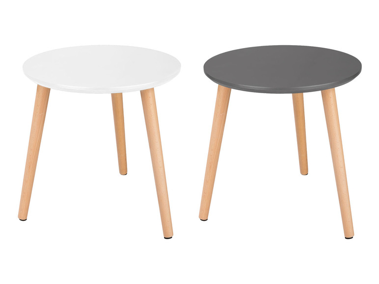 Deux tables basses rondes avec des pieds en bois, une blanche et une grise.