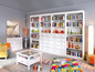 Des bibliothèques blanches, une commode à tiroirs, une table basse et un pouf coloré dans un salon moderne.