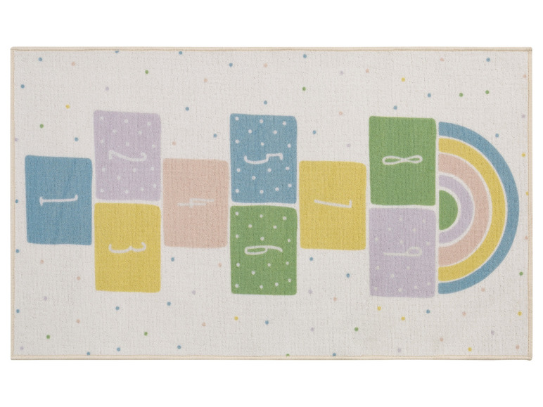 Un tapis blanc avec des carrés de couleurs et un arc-en-ciel.