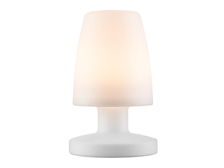 Une lampe de table blanche avec un abat-jour rond.