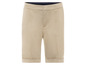Short beige avec ourlet retroussé.