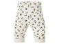 Pantalon blanc pour bébé avec imprimé de personnages de dessins animés et points colorés.