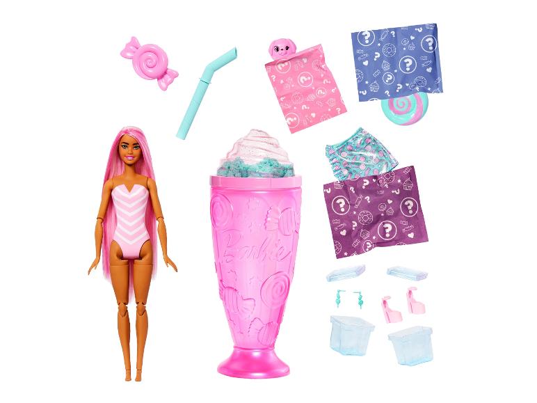 Poupée aux cheveux roses, shaker rose et accessoires surprises.