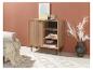 Une armoire en bois clair avec des étagères et des éléments décoratifs.