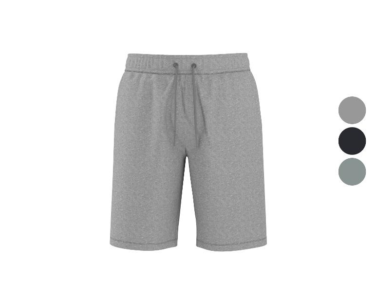 Shorts de survêtement gris avec cordon de serrage réglable, avec échantillons de couleurs noir et gris.
