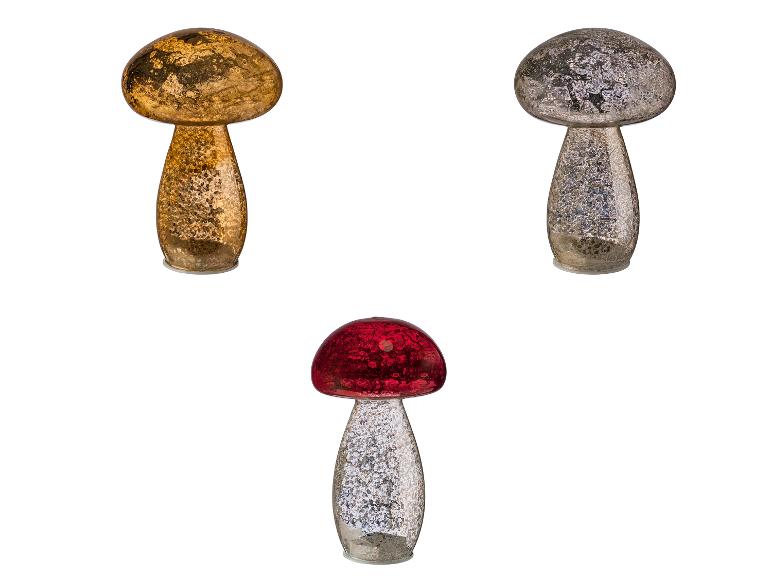 Trois décorations en forme de champignon en verre, or, argent et rouge.