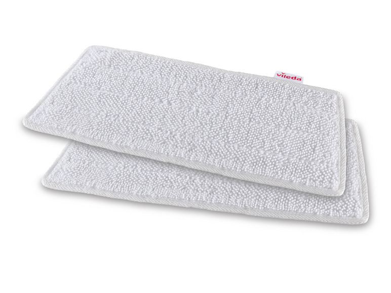 Deux tampons en microfibre Vileda pour nettoyer les sols.