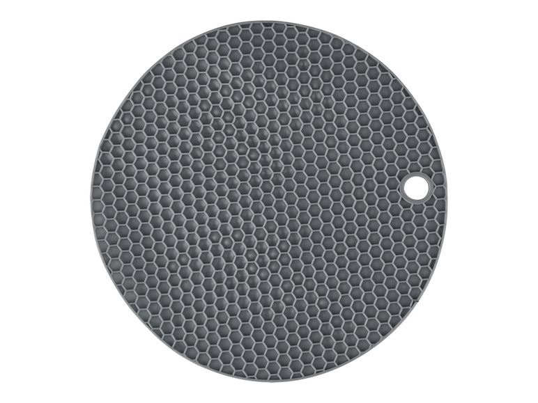 Un dessous de plat rond en silicone gris avec un motif en nid d'abeille.