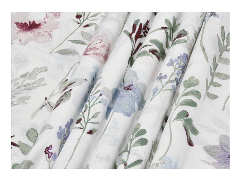 Tissu blanc à motifs floraux roses, violets et verts