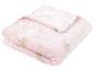 Couverture en peluche rose à étoiles pour bébé.