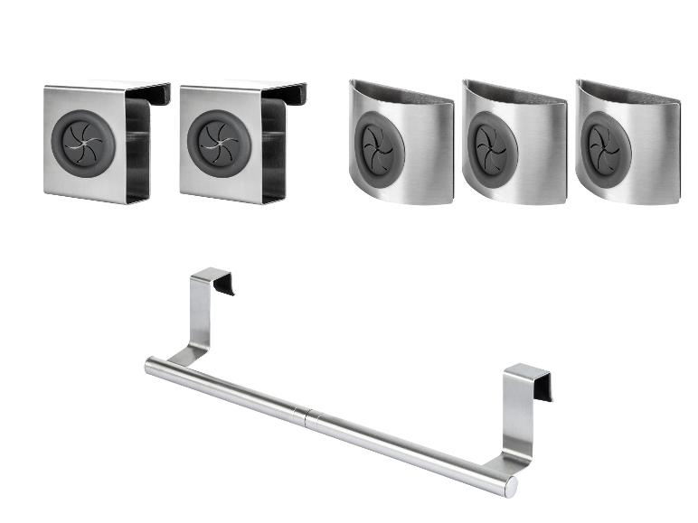 Trois supports ronds pour éponges, deux supports carrés pour éponges et un porte-serviettes.