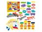 Ensemble de jeu de pâte à modeler avec moules, outils et cartes d'instructions.