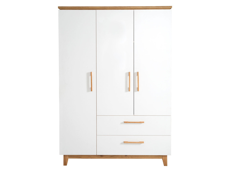 Une armoire blanche à deux portes et deux tiroirs.