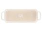Plat de cuisson rectangulaire beige avec poignées et six icônes d'utilisation.