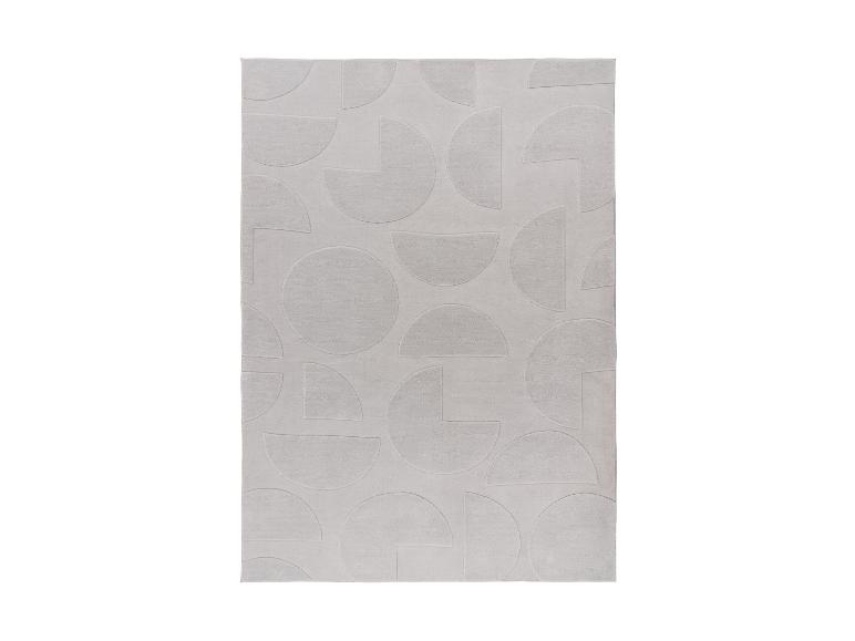 Tapis gris clair avec un motif géométrique de cercles et de demi-cercles.