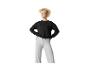 Sweat-shirt noir et pantalon gris clair : vêtements sport décontractés.