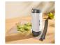Sac sous vide avec caramboles et scelleuse sous vide portable sur une table en bois.
