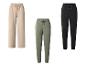 Trois pantalons de jogging: beige large, vert et noir avec chevilles resserrées.