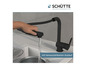 Un robinet de cuisine noir avec douchette extractible de Schütte.