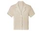 Chemise beige à manches courtes, col classique, boutonnée.