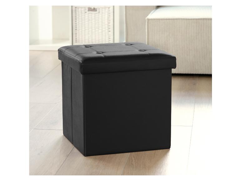 Un pouf de rangement noir avec un siège capitonné.