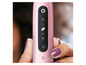 Une brosse à dents électrique rose avec plusieurs modes.