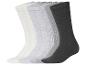 Lot de cinq paires de chaussettes côtelées dans les tons blanc, gris et noir.