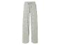 Pantalon large à motif géométrique beige clair.