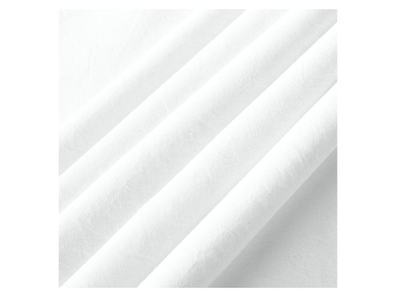 Tissu blanc, texture douce, idéal pour vêtements.