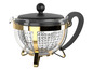 Une théière ou une cafetière en verre avec une bordure dorée et une poignée noire.