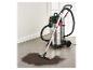 Aspirateur eau et poussière aspirant la saleté d'un sol gris.