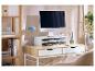 Support de moniteur LIVARNO home sur un bureau en bois.